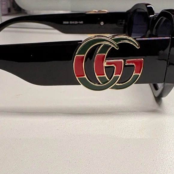 Gucci Women's Elegant Black Sunglasses - Picture 2 of 2